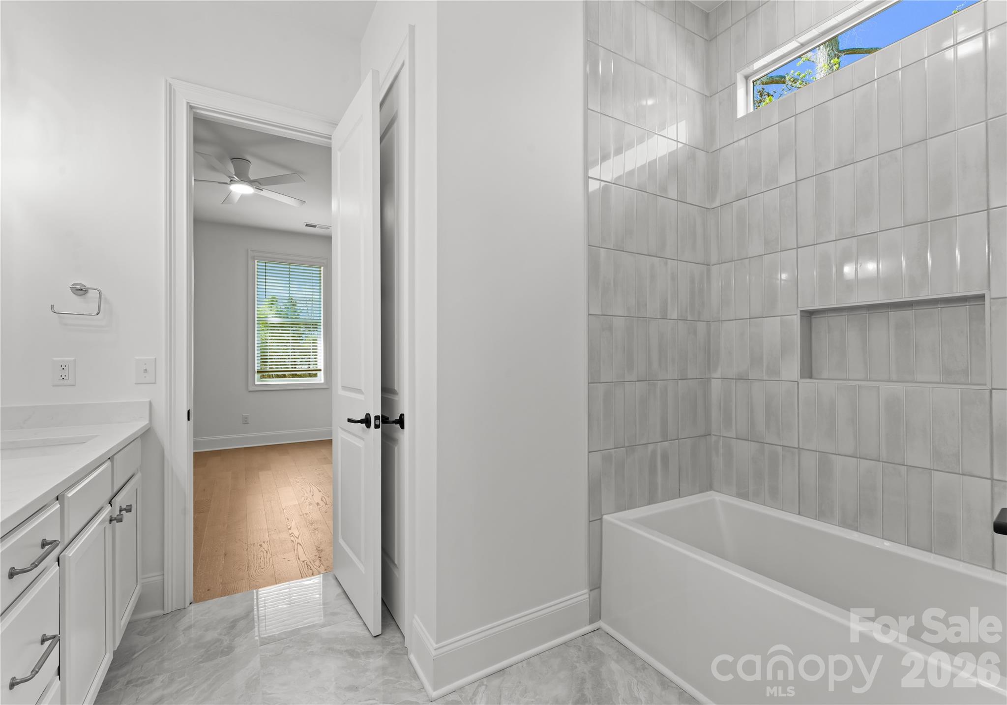 121 Vella Drive Locust, NC 28097 - Photo 34 of 46 a bathroom with a bathtub and a sink