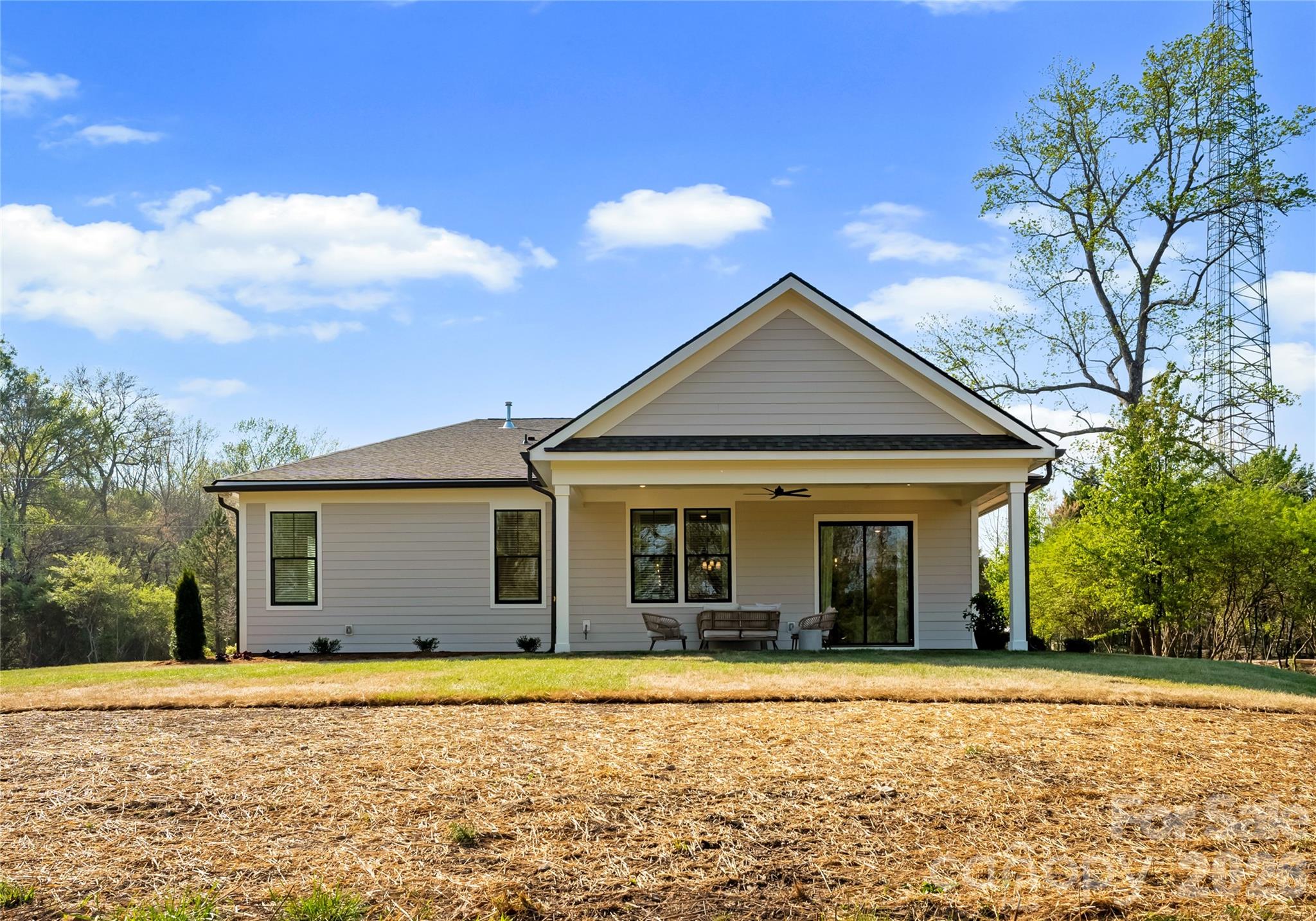 121 Vella Drive Locust, NC 28097 - Photo 43 of 46 a front view of a house with a garden