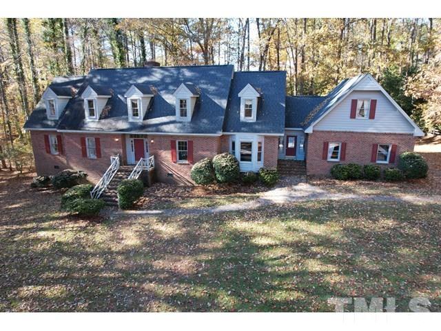 11705 Old Creedmoor Road Raleigh, NC 27613 - Photo 1 of 33 a view of front a house with a yard