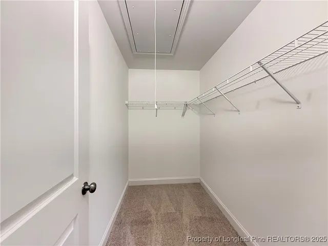 a view of a room with racks on the wall