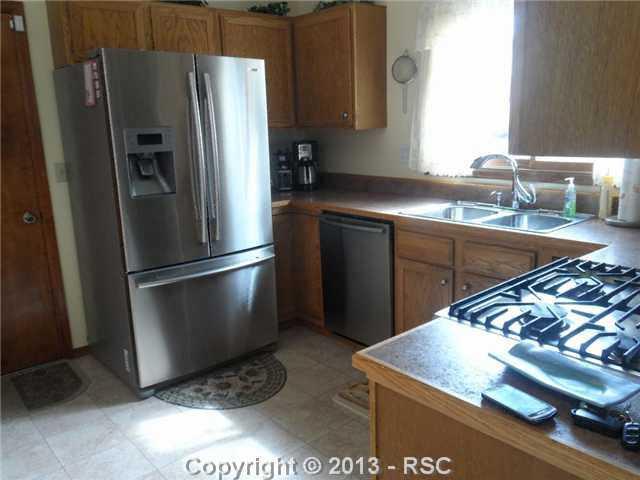 5160 Solar Ridge Drive Colorado Springs, CO 80917 - Photo 18 of 25 Stainless appliances all stay, french door refrigerator