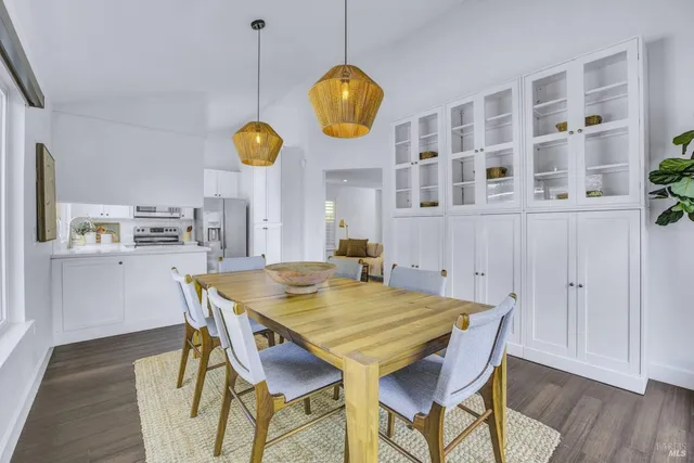 a view of dining room and wooden floor