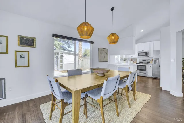 a view of a dining room and livingroom