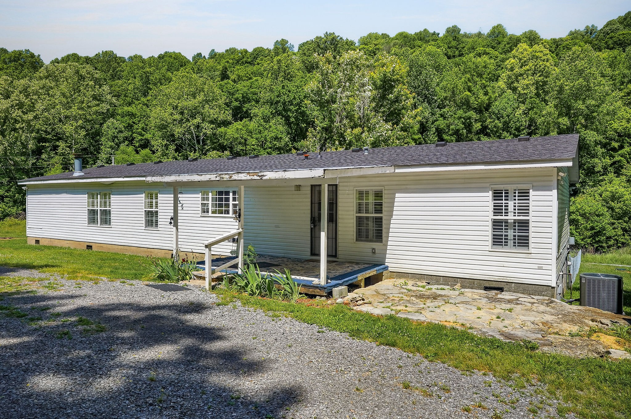 16130 Buffalo Valley Road Silver Point, TN 38582 - Photo 42 of 47 a view of a house with yard and a garden