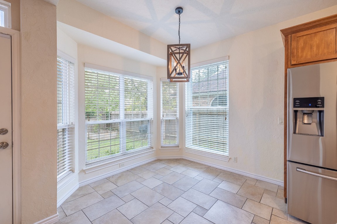 8514 Racine Trail Austin, TX 78717 - Photo 16 of 33 Unfurnished dining area with healthy amount of natural light