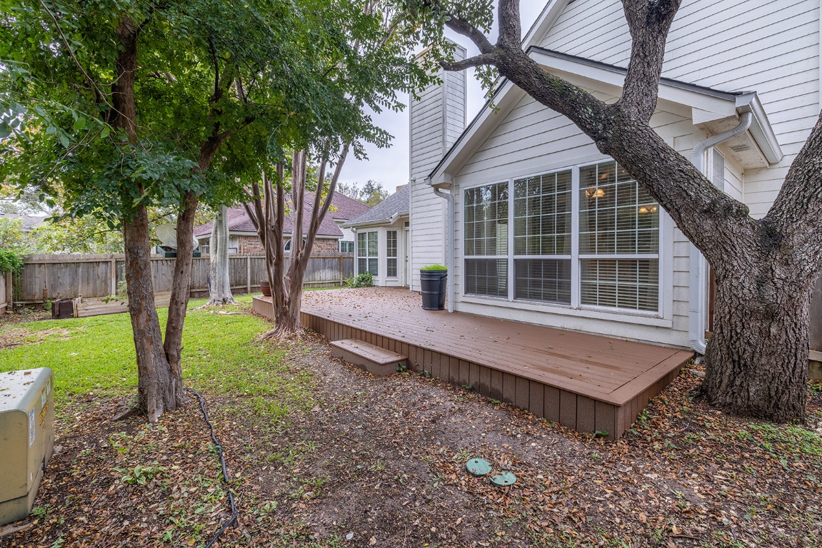 8514 Racine Trail Austin, TX 78717 - Photo 5 of 33 Fenced backyard with a deck