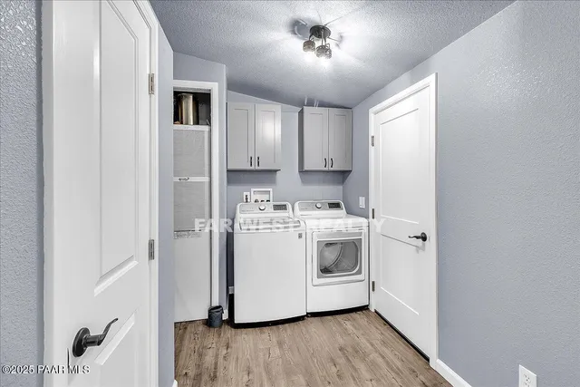 a view of utility room with washer and dryer