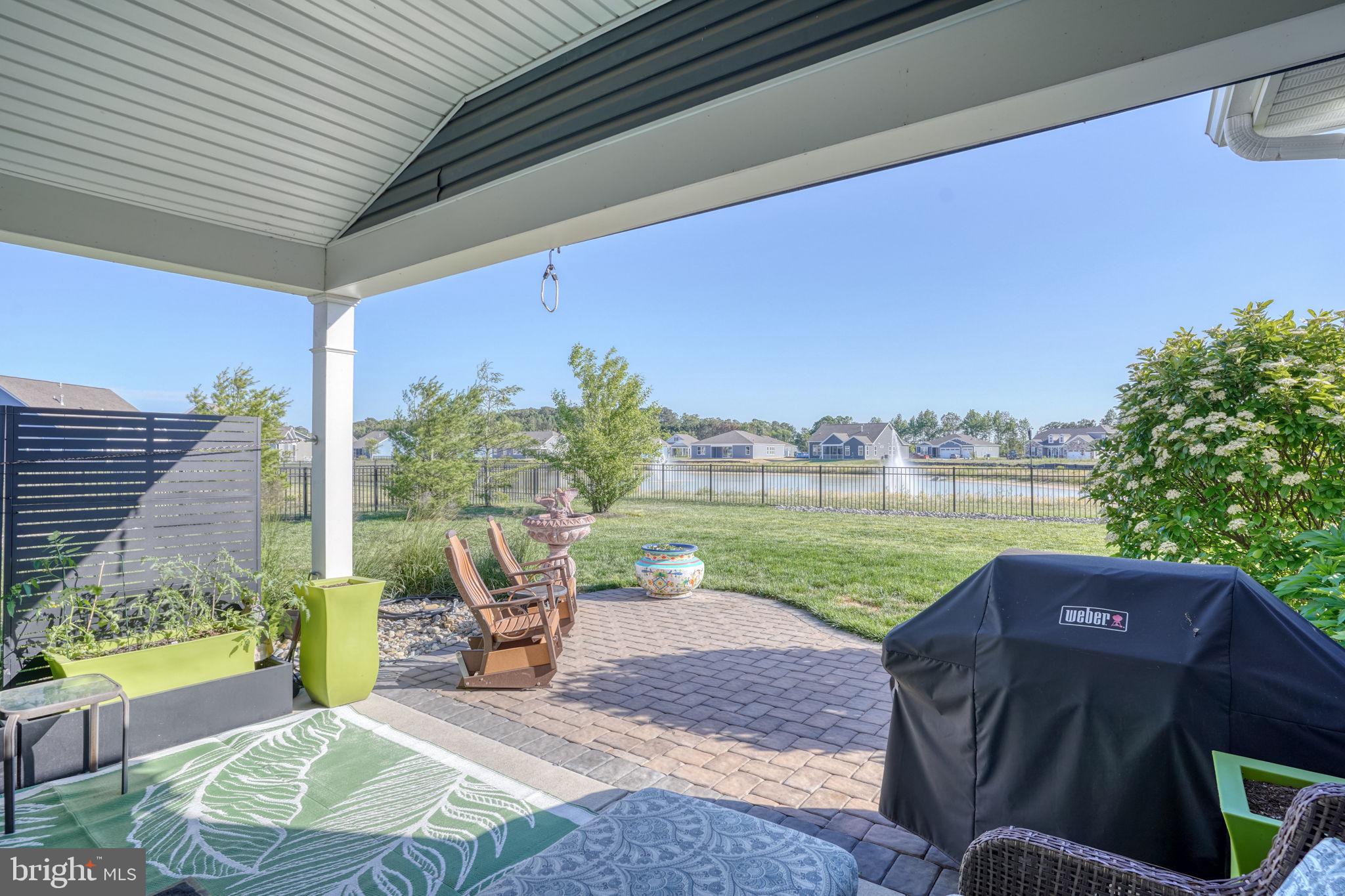 15272 Crape Myrtle Road Milton, DE 19968 - Photo 20 of 61 Serene patio with scenic water views.