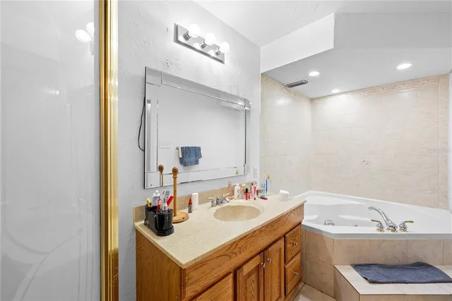 a bathroom with a sink double vanity and a mirror