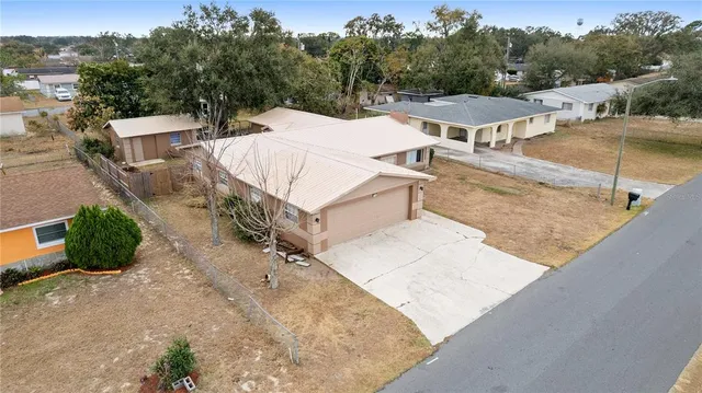 a view of a patio with a yard
