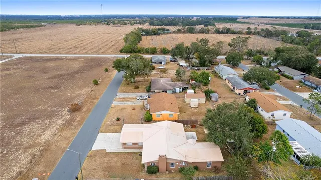 a view of lake and houses with outdoor space