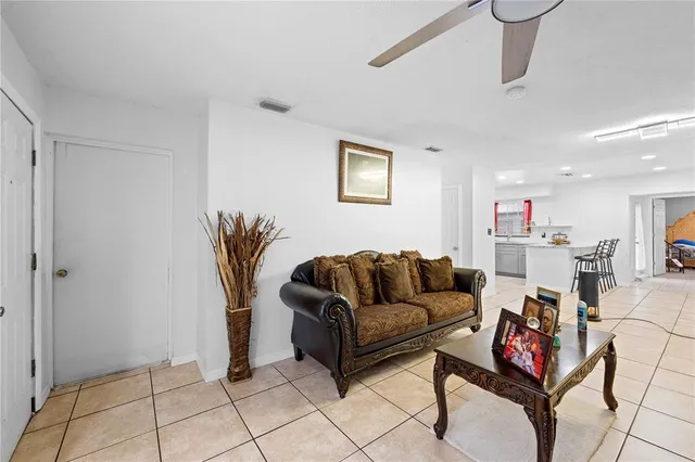 a living room with furniture and a couch