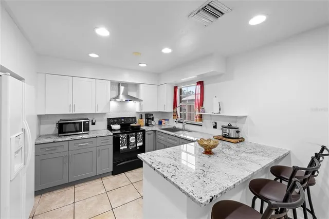 a kitchen with sink cabinets and counter space