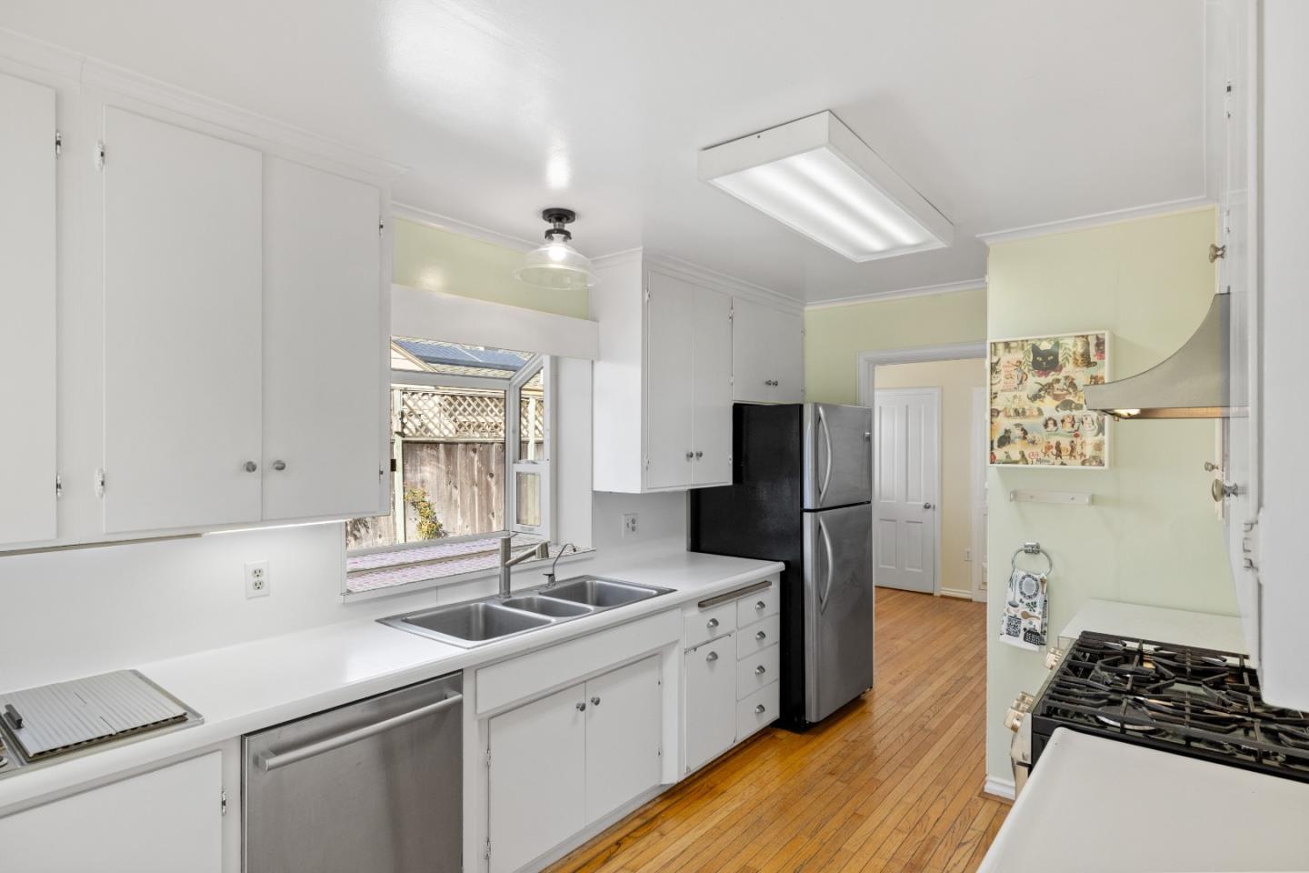 330 Homestead Avenue Salinas, CA 93901 - Photo 11 of 51 a kitchen with a sink stove and refrigerator