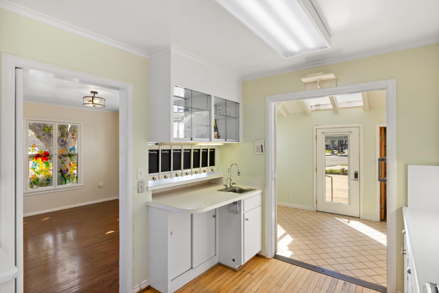 330 Homestead Avenue Salinas, CA 93901 - Photo 14 of 51 a view of a hallway with wooden floor and dining room