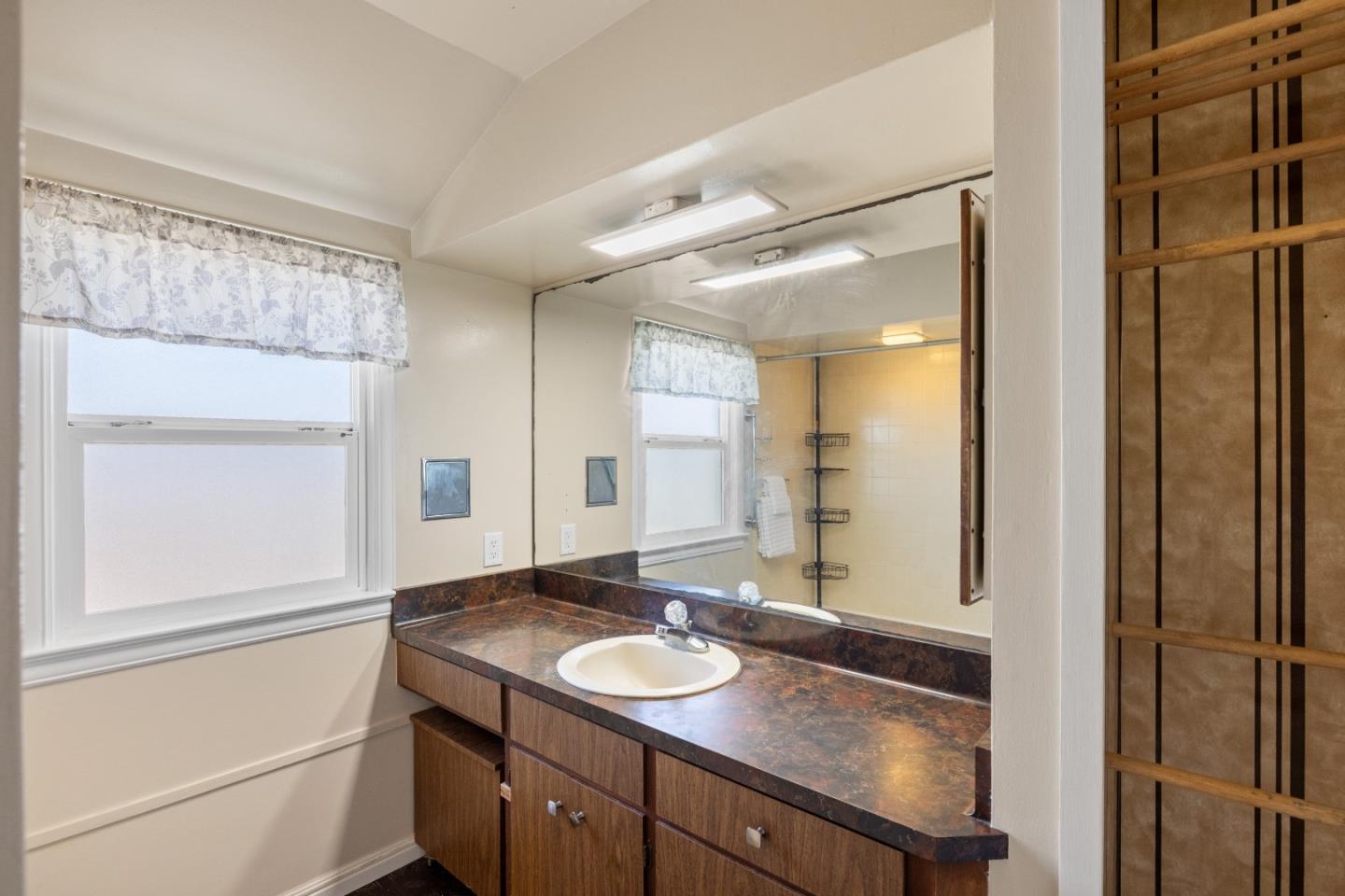 330 Homestead Avenue Salinas, CA 93901 - Photo 18 of 51 a bathroom with a sink and a mirror