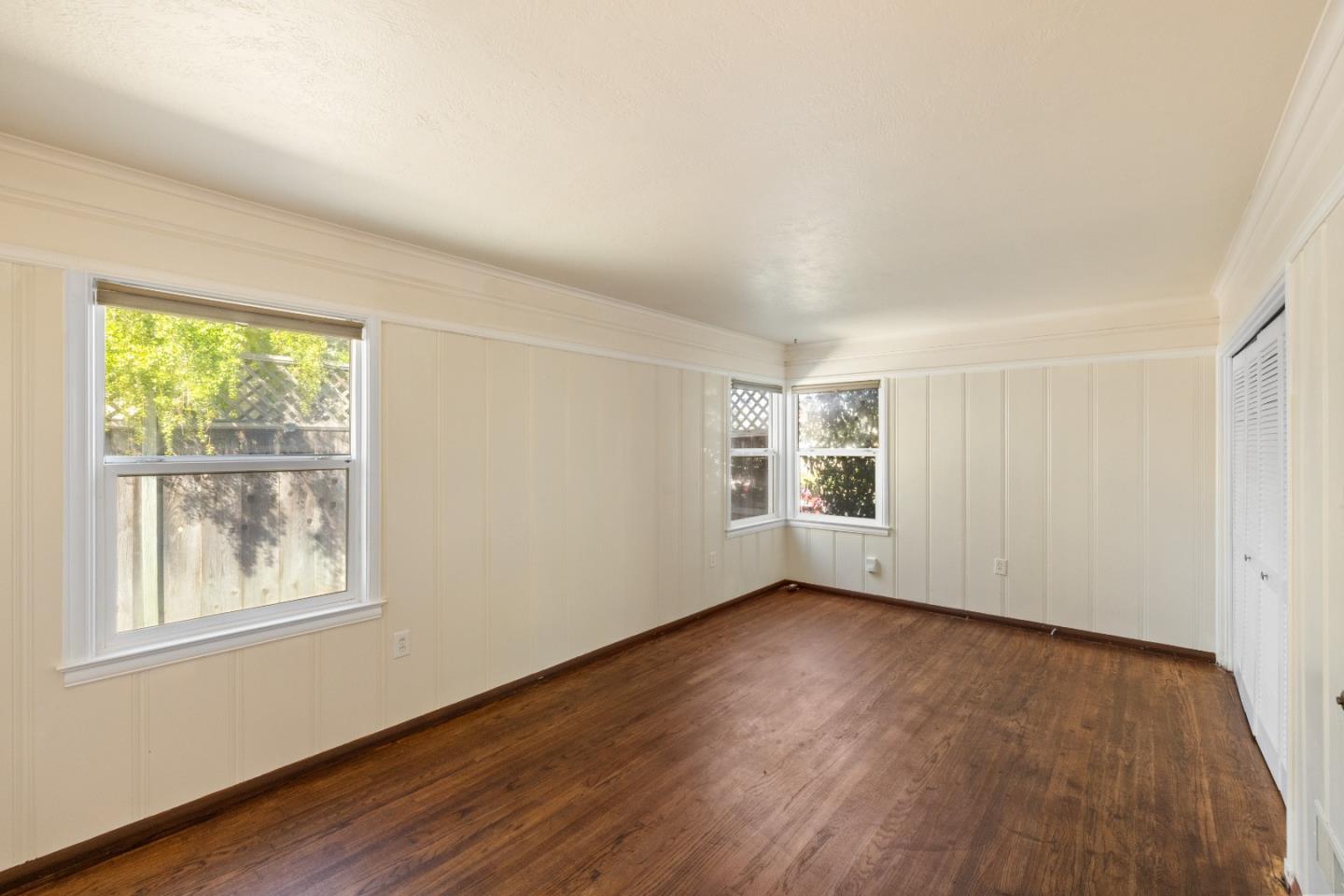 330 Homestead Avenue Salinas, CA 93901 - Photo 24 of 51 a view of an empty room with wooden floor and a window