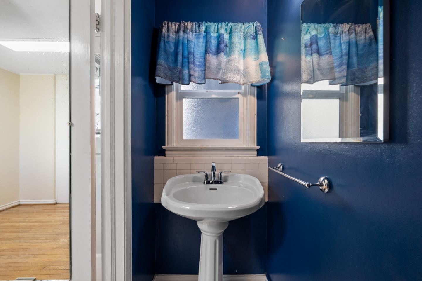 330 Homestead Avenue Salinas, CA 93901 - Photo 29 of 51 a bathroom with a sink and a mirror