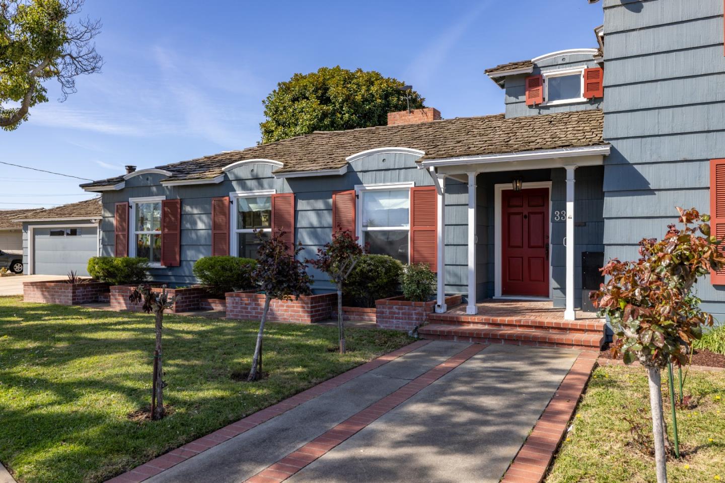 330 Homestead Avenue Salinas, CA 93901 - Photo 4 of 51 a front view of a house with a yard