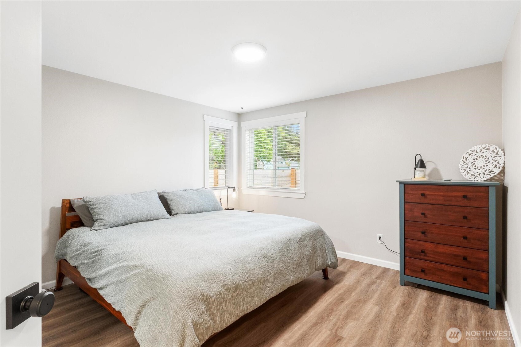 21910 Southeast 239th Street Maple Valley, WA 98038 - Photo 13 of 38 a bedroom with a bed and a dresser