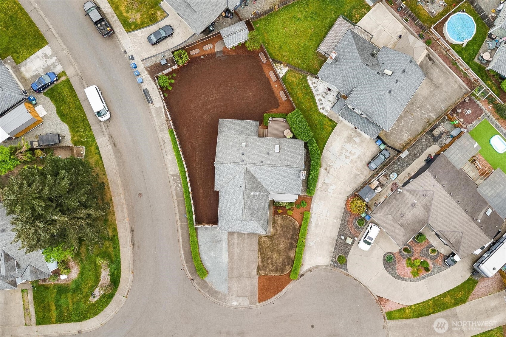 21910 Southeast 239th Street Maple Valley, WA 98038 - Photo 36 of 38 an aerial view of residential house with outdoor space and swimming pool