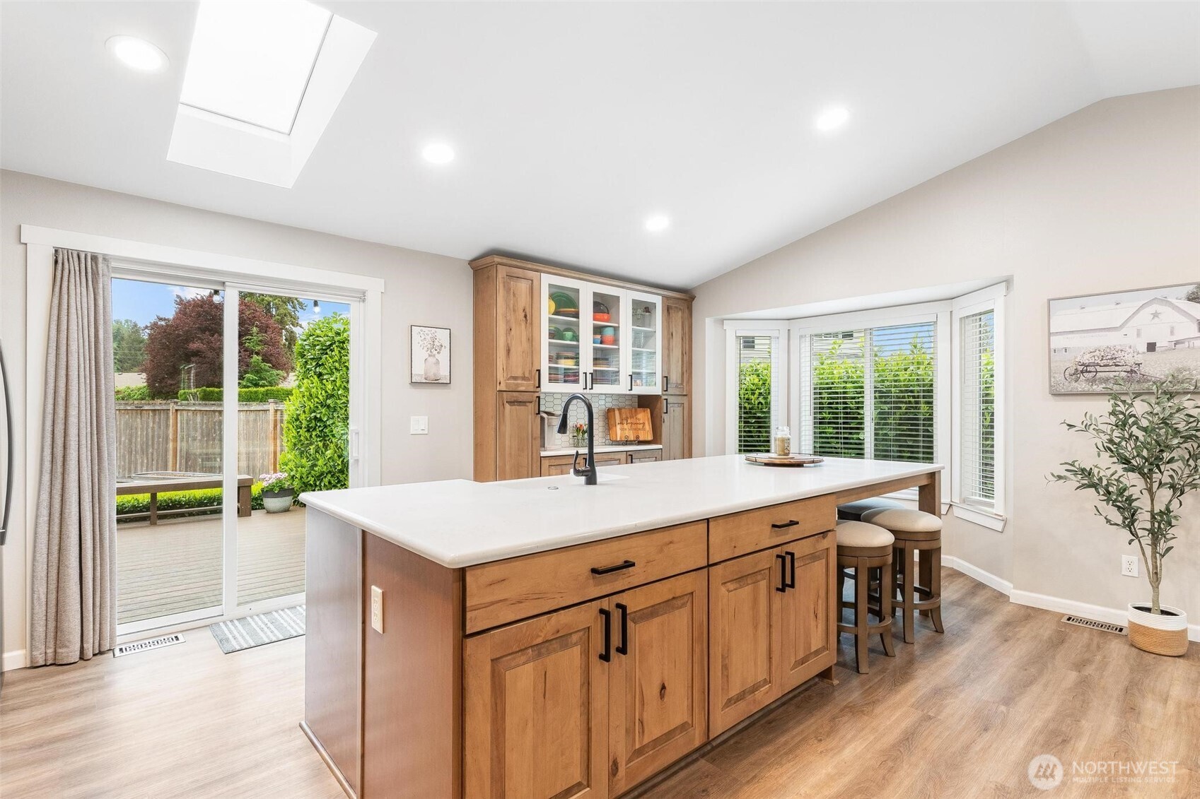 21910 Southeast 239th Street Maple Valley, WA 98038 - Photo 6 of 38 a large white kitchen with a large window