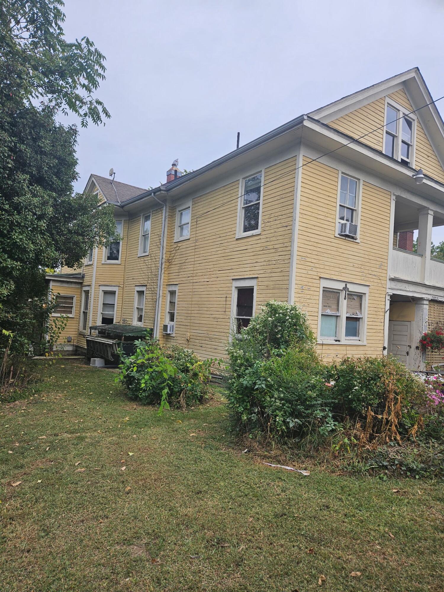 1215 Franklin Road Southwest Roanoke, VA 24016 - Photo 2 of 2 a view of a house with a yard