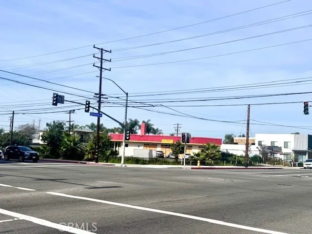 a view of a food mall next to a yard
