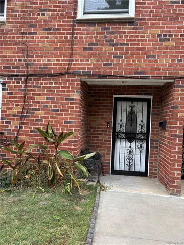 a front view of a house with a garage