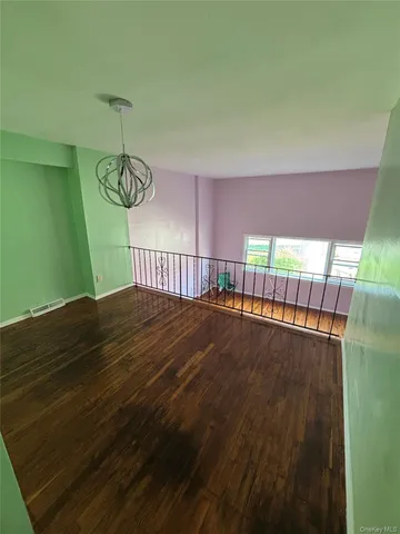 a view of a balcony with a swimming pool