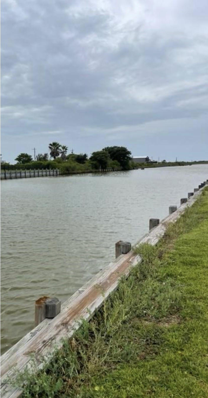 1157 Pompano Crystal Beach Crystal Beach, TX 77650 - Photo 3 of 3 a view of a lake from a yard