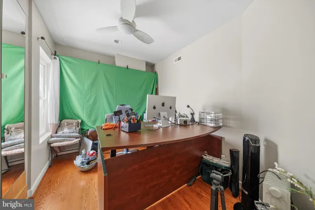 a room with furniture and a large window