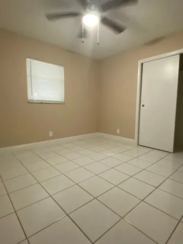 a view of an empty room and window