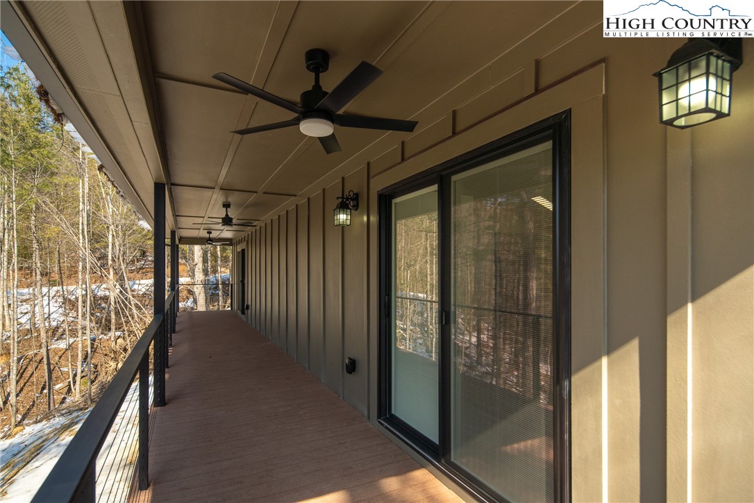 114 Woodpecker Road Purlear, NC 28665 - Photo 28 of 47 a view of a hallway with a glass door