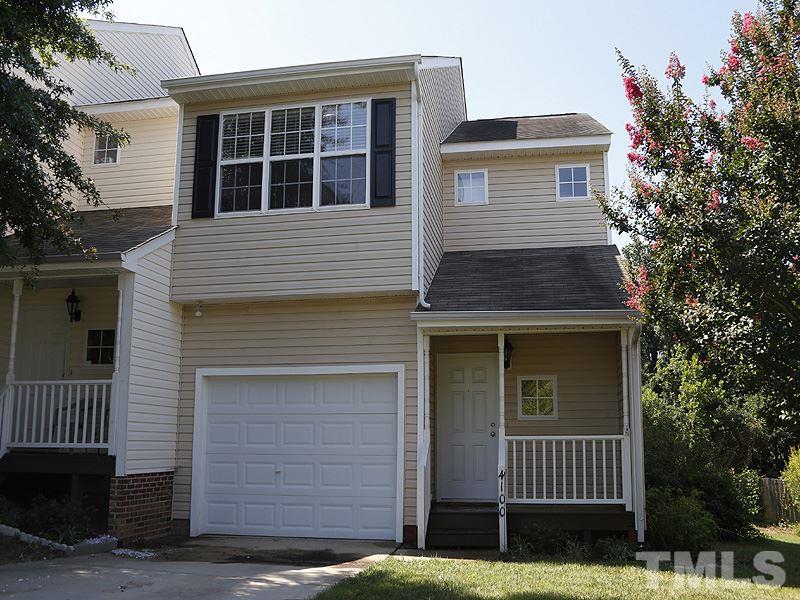 4100 Standing Rock Way Raleigh, NC 27604 - Photo 1 of 11 a front view of a house with garage
