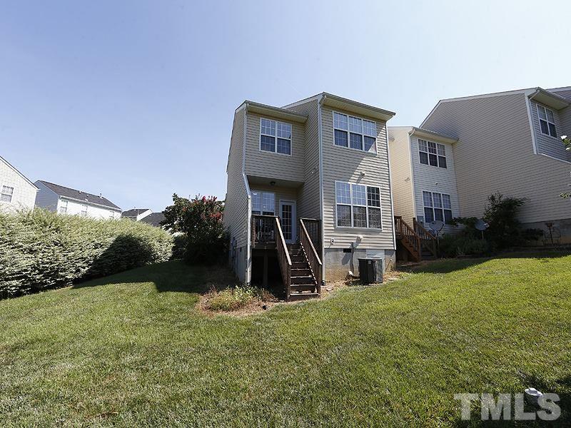 4100 Standing Rock Way Raleigh, NC 27604 - Photo 11 of 11 a view of a house with a yard