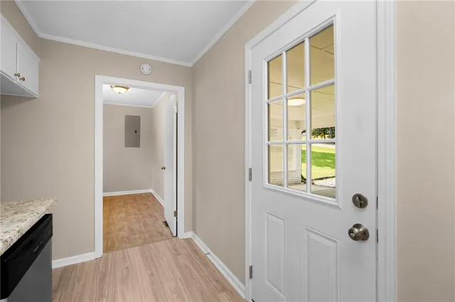 a view of a bathroom from a hallway