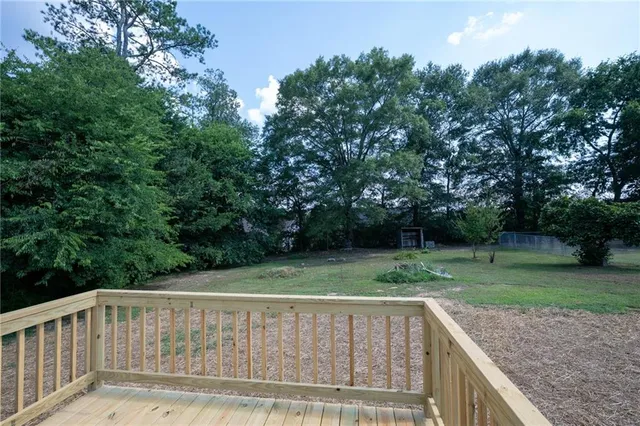 a view of backyard with green space