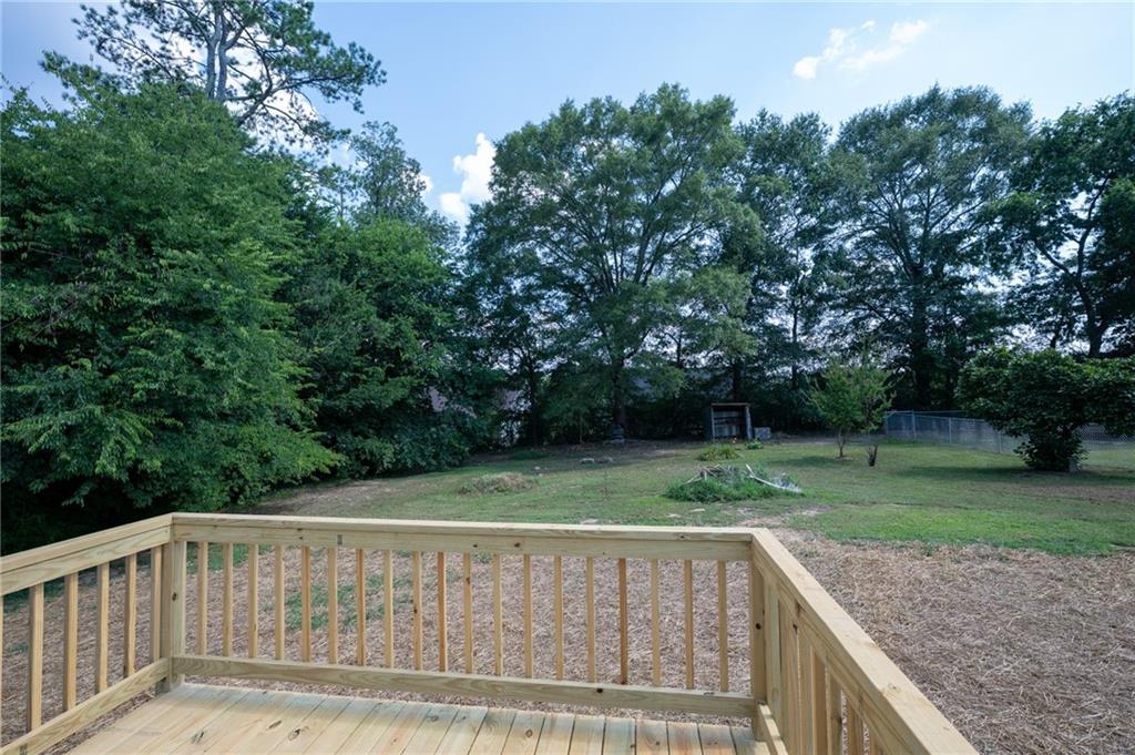 111 Nike Drive Calhoun, GA 30701 - Photo 31 of 36 a view of backyard with green space