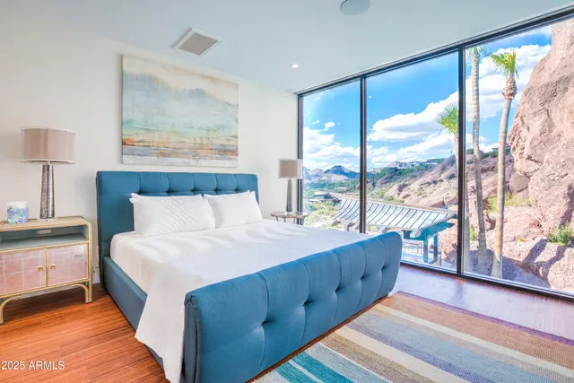 a backyard of a house with outdoor seating