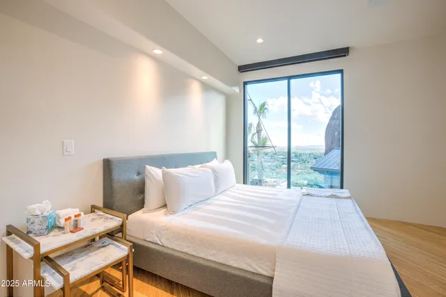a view of a living room and kitchen