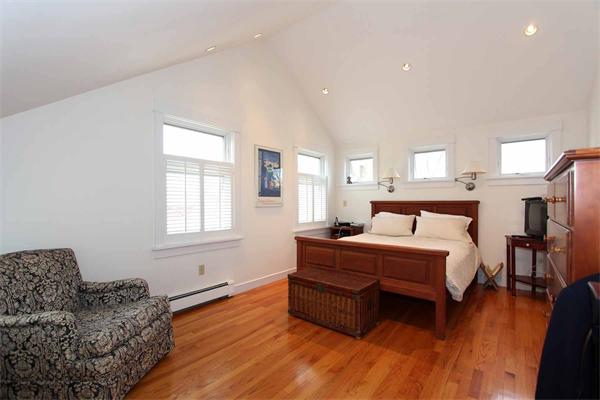 139 Richdale Road Needham, MA 02494 - Photo 15 of 25 a bed room with bed and a couch