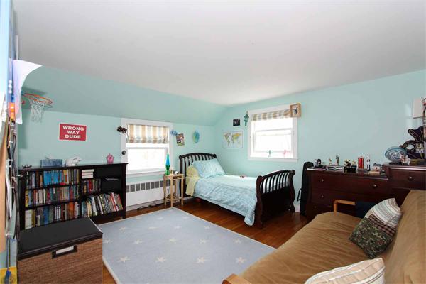 139 Richdale Road Needham, MA 02494 - Photo 18 of 25 a living room with furniture and a window