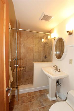 139 Richdale Road Needham, MA 02494 - Photo 22 of 25 a bathroom with a sink toilet and shower