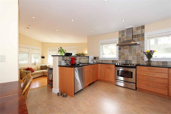 139 Richdale Road Needham, MA 02494 - Photo 8 of 25 a kitchen with stainless steel appliances granite countertop a stove and cabinets