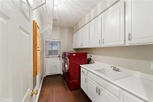 a view of a storage & utility room with washer and dryer