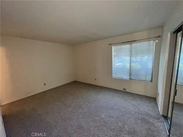 an empty room with window
