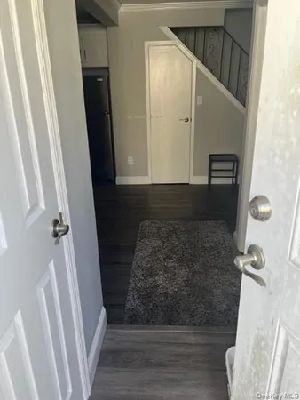 a bathroom with a granite countertop shower