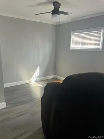 a kitchen with a refrigerator sink and cabinets