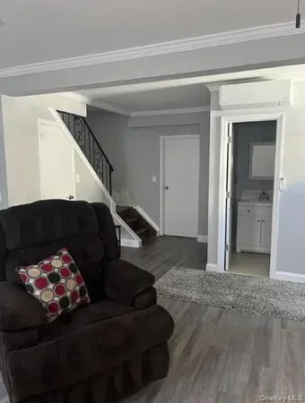a bathroom with a sink toilet and mirror
